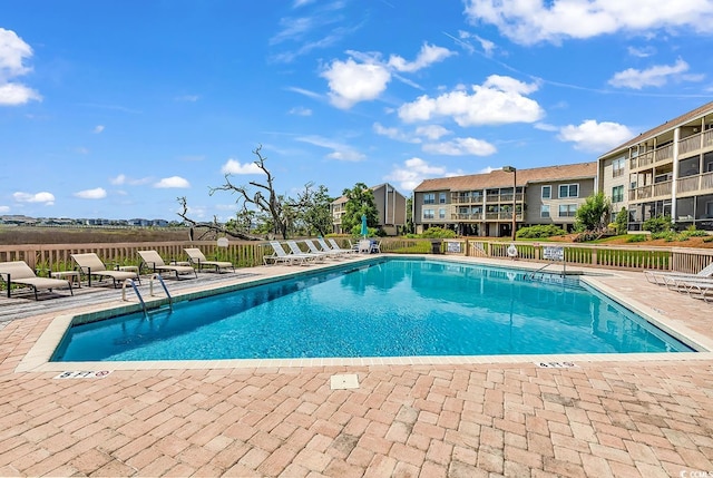 140 S Cove Pl Unit 6C, Pawleys Island, SC 29585 - community pool with a patio area