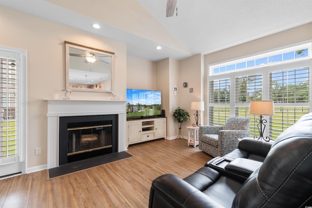 503 20th Ave N Unit 29-C, North Myrtle Beach, SC 29582 - living room featuring a ceiling fan, wood finished floors, a fireplace with flush hearth, recessed lighting, and high vaulted ceiling
