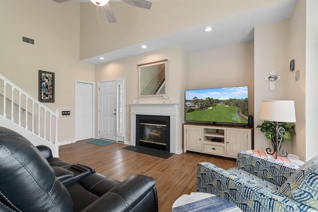 503 20th Ave N Unit 29-C, North Myrtle Beach, SC 29582 - living room with wood finished floors, stairway, ceiling fan, recessed lighting, and a fireplace with flush hearth