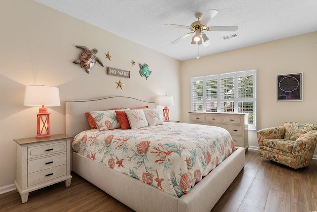503 20th Ave N Unit 29-C, North Myrtle Beach, SC 29582 - bedroom with wood finished floors, a ceiling fan, and a textured ceiling