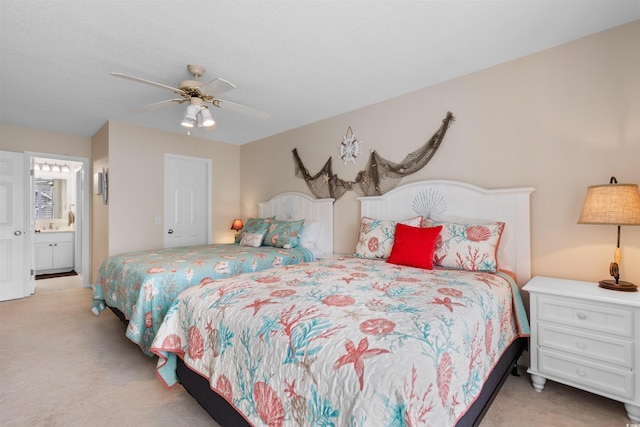 503 20th Ave N Unit 29-C, North Myrtle Beach, SC 29582 - carpeted bedroom with ensuite bath and a ceiling fan