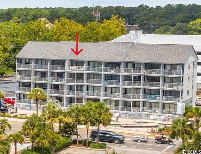 2000 S Ocean Blvd Unit V405, Myrtle Beach, SC 29577 - view of apartment building / complex featuring a view of trees