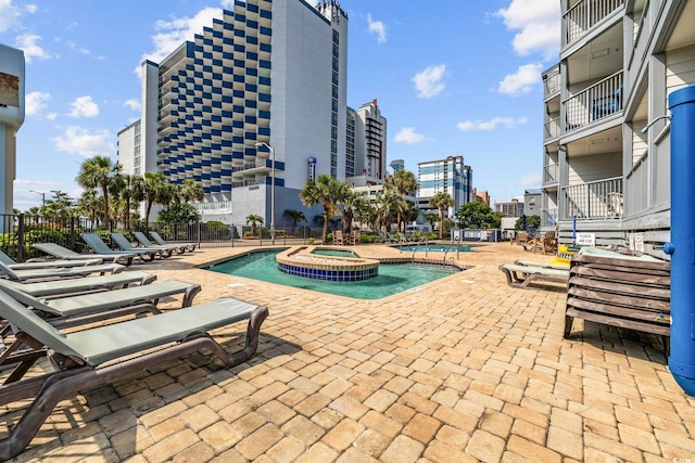 2000 S Ocean Blvd Unit V405, Myrtle Beach, SC 29577 - community pool featuring a community hot tub and a patio