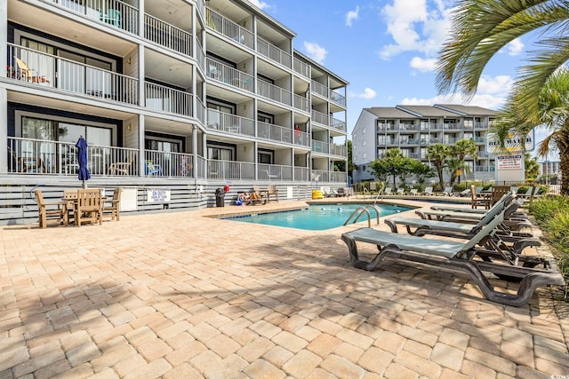 2000 S Ocean Blvd Unit V405, Myrtle Beach, SC 29577 - community pool with a patio area