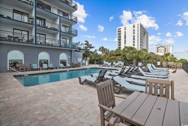 2000 S Ocean Blvd Unit V405, Myrtle Beach, SC 29577 - community pool with a patio area