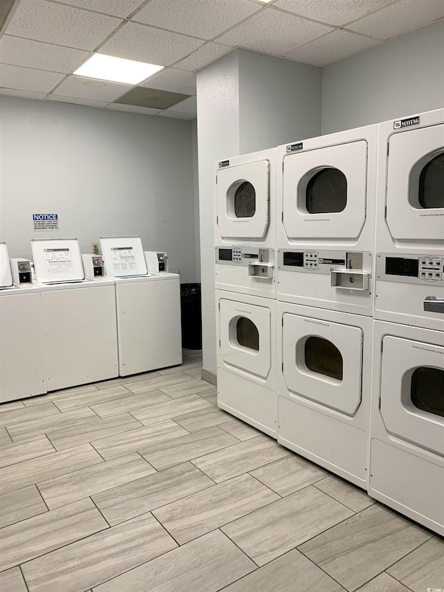 2000 S Ocean Blvd Unit V405, Myrtle Beach, SC 29577 - shared laundry with washer and dryer, stacked washing machine and dryer, and light wood-style floors