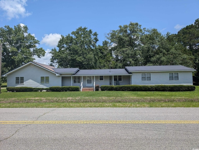 5370 Miracle Ln, Conway, SC 29526 - ranch-style home featuring a front yard, a porch, and a metal roof