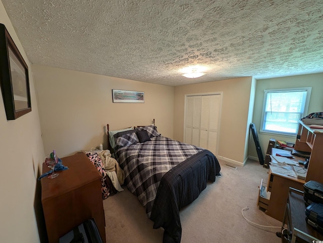 5370 Miracle Ln, Conway, SC 29526 - bedroom featuring a textured ceiling, a closet, and carpet