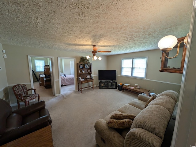 5370 Miracle Ln, Conway, SC 29526 - carpeted living area featuring a textured ceiling and ceiling fan