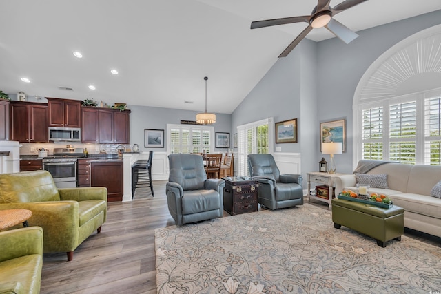 1413 Cottage Cove Cir N, Myrtle Beach, SC 29582 - living area with light wood-style floors, recessed lighting, ceiling fan, and high vaulted ceiling
