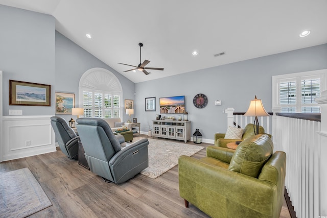 1413 Cottage Cove Cir N, Myrtle Beach, SC 29582 - living area with ceiling fan, wood finished floors, high vaulted ceiling, recessed lighting, and wainscoting