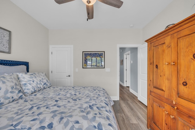 1413 Cottage Cove Cir N, Myrtle Beach, SC 29582 - bedroom with wood finished floors and ceiling fan