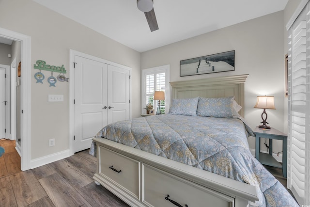 1413 Cottage Cove Cir N, Myrtle Beach, SC 29582 - bedroom with dark wood finished floors, a closet, and a ceiling fan