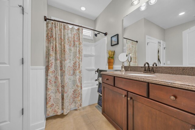 1413 Cottage Cove Cir N, Myrtle Beach, SC 29582 - full bathroom with vanity, shower / tub combo, tile patterned floors, and wainscoting