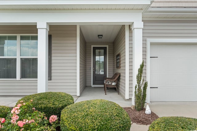 308 Firenze Loop, Myrtle Beach, SC 29579 - property entrance with covered porch and a garage
