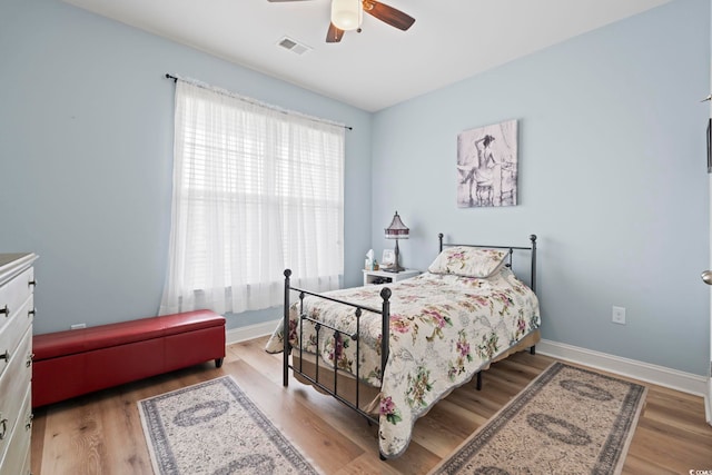 308 Firenze Loop, Myrtle Beach, SC 29579 - bedroom with wood finished floors and a ceiling fan