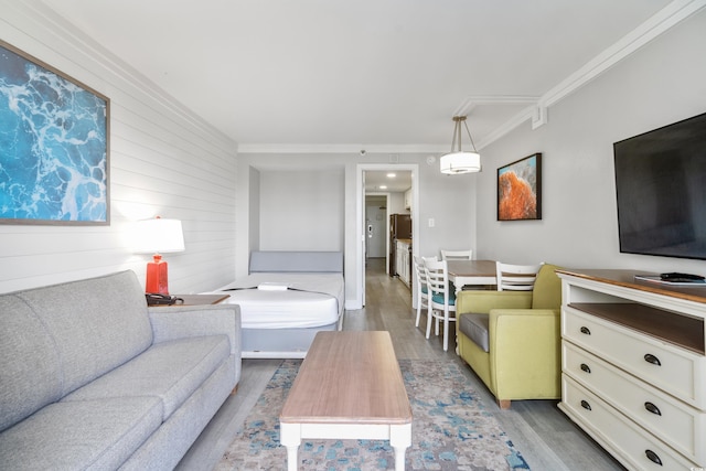 7200 N Ocean Blvd Unit 257, Myrtle Beach, SC 29572 - living room featuring crown molding, wood finished floors, and wooden walls