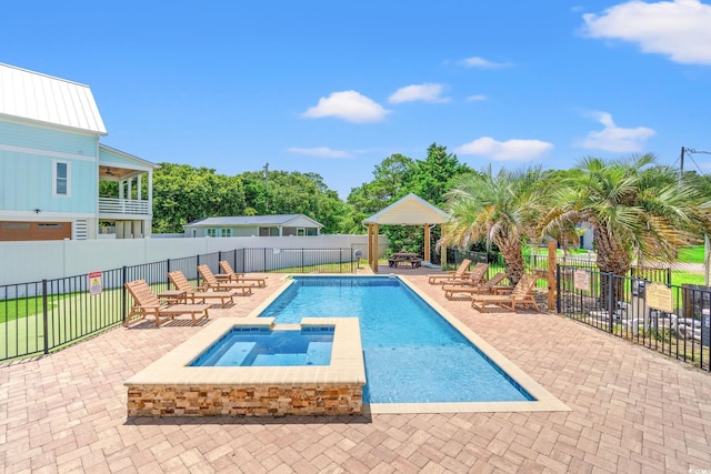 4806 S Ocean Blvd, Surfside Beach, SC 29575 - view of swimming pool featuring a patio, a gazebo, and a pool with connected hot tub