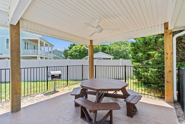 4806 S Ocean Blvd, Surfside Beach, SC 29575 - fenced backyard with a ceiling fan, outdoor dining area, and a patio area