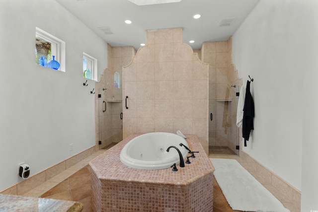 9737 Catalonia Ct, Myrtle Beach, SC 29579 - full bathroom with a jetted tub, a stall shower, recessed lighting, and tile patterned flooring
