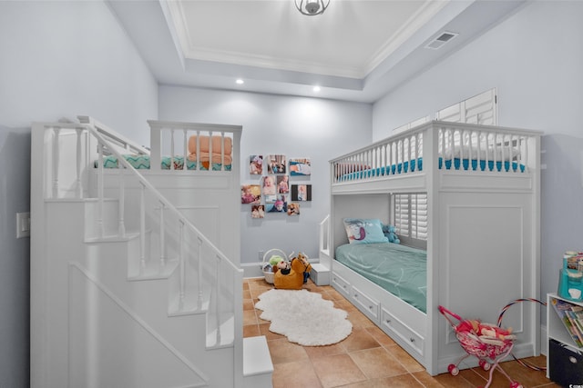 9737 Catalonia Ct, Myrtle Beach, SC 29579 - bedroom with ornamental molding, tile patterned flooring, a tray ceiling, and recessed lighting