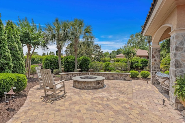 9737 Catalonia Ct, Myrtle Beach, SC 29579 - view of patio with an outdoor fire pit