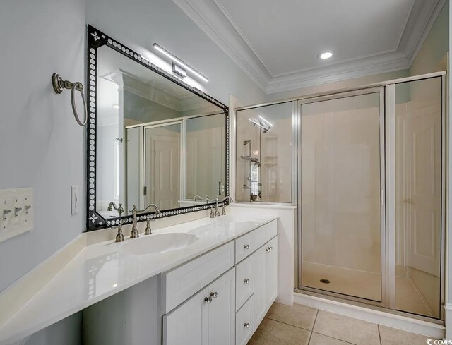 1613 James Island Ave, North Myrtle Beach, SC 29582 - bathroom featuring double vanity, a stall shower, ornamental molding, and tile patterned floors