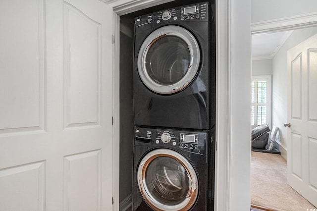 1613 James Island Ave, North Myrtle Beach, SC 29582 - laundry area with stacked washer and clothes dryer, crown molding, and carpet floors
