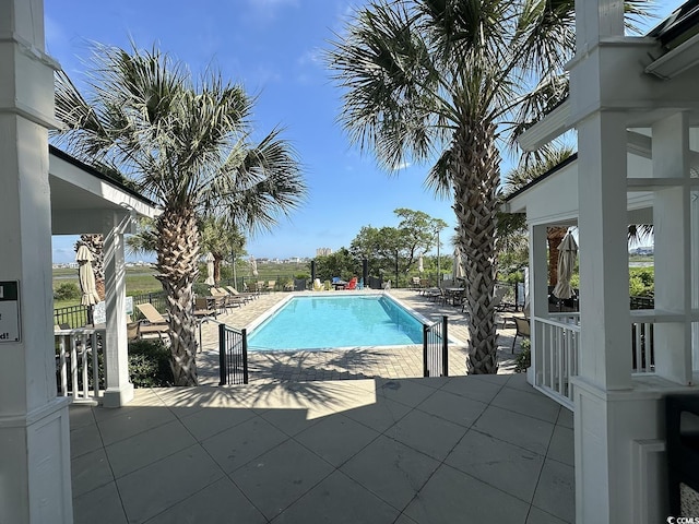 1613 James Island Ave, North Myrtle Beach, SC 29582 - community pool featuring a patio area