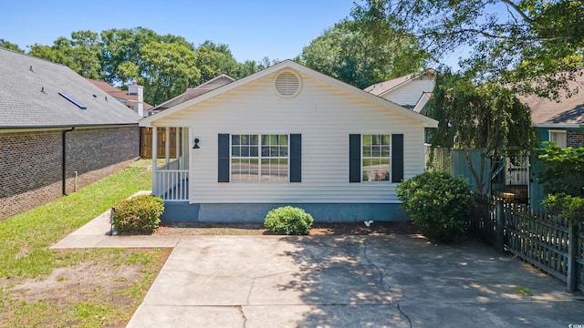 10071 Kings Rd, Myrtle Beach, SC 29572 - view of front of house with a patio area
