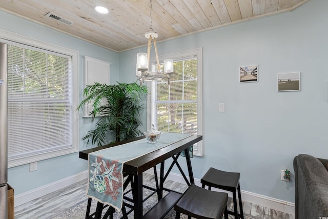 10071 Kings Rd, Myrtle Beach, SC 29572 - dining space featuring a chandelier, wood ceiling, wood finished floors, crown molding, and recessed lighting