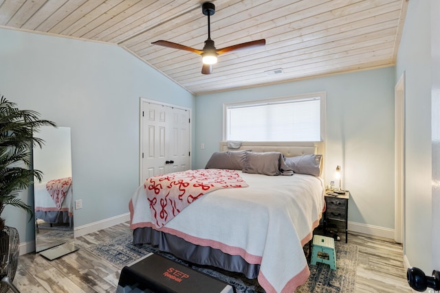 10071 Kings Rd, Myrtle Beach, SC 29572 - bedroom featuring wood ceiling, vaulted ceiling, wood finished floors, a closet, and ceiling fan
