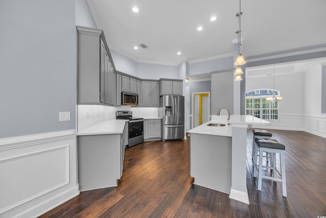 760 Carolina Farms Blvd, Myrtle Beach, SC 29579 - kitchen featuring stainless steel appliances, gray cabinets, ornamental molding, light countertops, and a chandelier