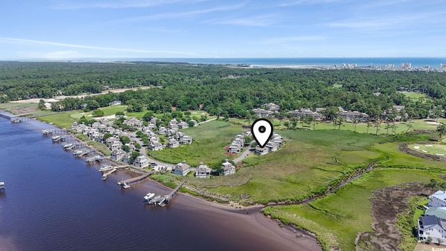1663 Harbor Dr, North Myrtle Beach, SC 29582 - aerial view of a large body of water and a heavily wooded area