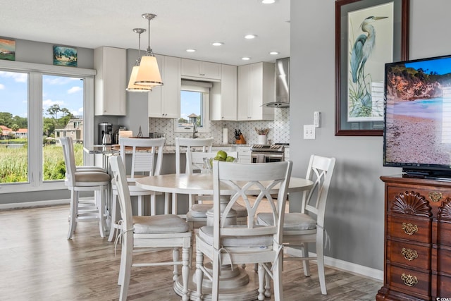 1663 Harbor Dr, North Myrtle Beach, SC 29582 - dining space featuring light wood-type flooring and recessed lighting