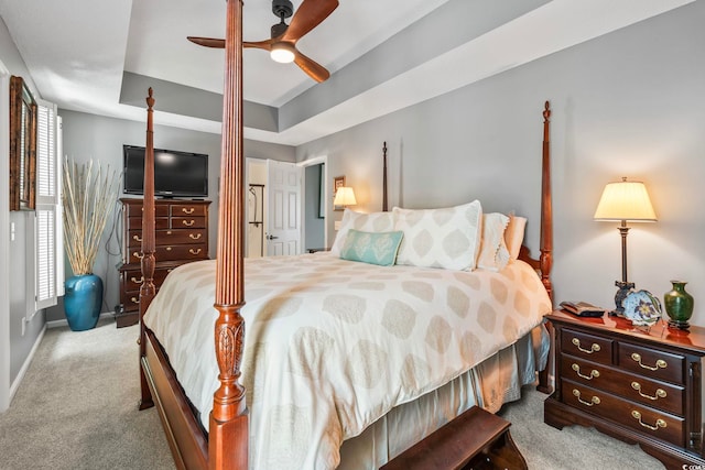 1663 Harbor Dr, North Myrtle Beach, SC 29582 - bedroom with carpet floors, a raised ceiling, and ceiling fan