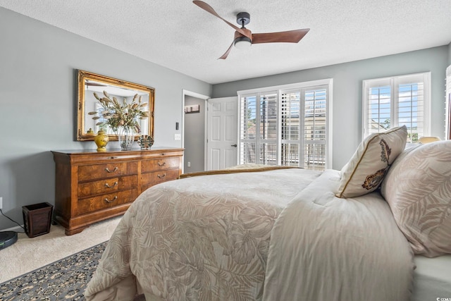 1663 Harbor Dr, North Myrtle Beach, SC 29582 - bedroom featuring carpet flooring, a textured ceiling, and ceiling fan