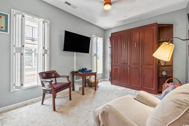 1663 Harbor Dr, North Myrtle Beach, SC 29582 - living room with light carpet and a ceiling fan