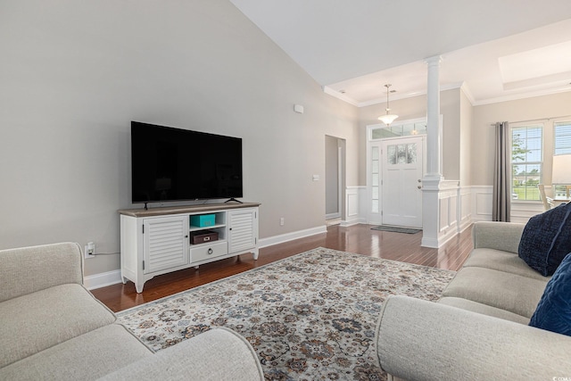 2010 Chattooga Ct, Myrtle Beach, SC 29588 - living room featuring ornate columns, crown molding, wood finished floors, wainscoting, and a high ceiling