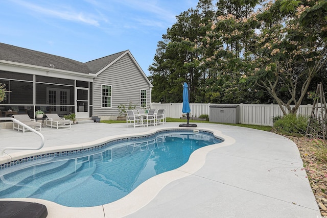 2010 Chattooga Ct, Myrtle Beach, SC 29588 - view of pool featuring a sunroom, a patio area, and a fenced backyard