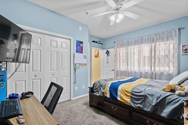 1401 Lighthouse Dr Unit 4334, North Myrtle Beach, SC 29582 - bedroom with a closet, carpet, a textured ceiling, and ceiling fan