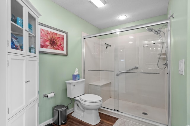 1401 Lighthouse Dr Unit 4334, North Myrtle Beach, SC 29582 - full bath featuring wood finished floors, a stall shower, and a textured ceiling