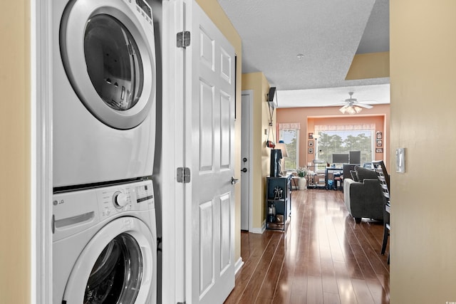 1401 Lighthouse Dr Unit 4334, North Myrtle Beach, SC 29582 - laundry room with stacked washing machine and dryer, dark wood-style flooring, and a ceiling fan