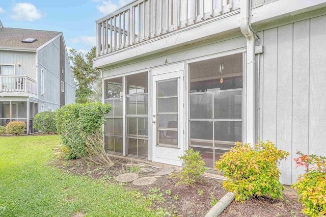 3700 Golf Colony Ln Unit 26A, Little River, SC 29566 - view of home's exterior featuring a balcony and a lawn