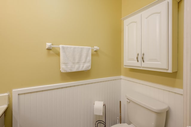 3700 Golf Colony Ln Unit 26A, Little River, SC 29566 - half bath featuring wainscoting and vanity