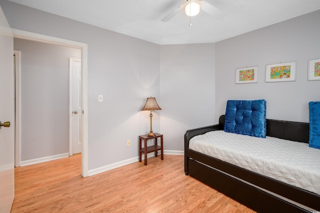 3700 Golf Colony Ln Unit 26A, Little River, SC 29566 - bedroom featuring light wood-style floors and a ceiling fan