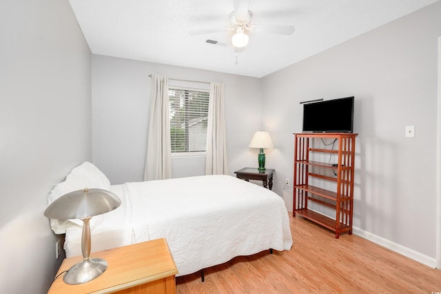 3700 Golf Colony Ln Unit 26A, Little River, SC 29566 - bedroom featuring light wood-type flooring and a ceiling fan