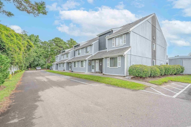 3700 Golf Colony Ln Unit 26A, Little River, SC 29566 - multi unit property featuring a shingled roof and uncovered parking