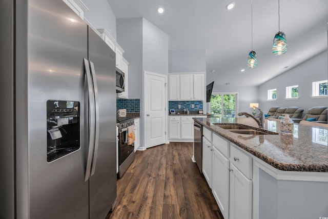 1520 Jardine Loop, Little River, SC 29566 - kitchen with appliances with stainless steel finishes, dark wood-style flooring, white cabinetry, lofted ceiling, and backsplash