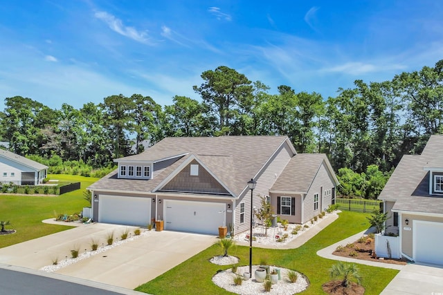 1520 Jardine Loop, Little River, SC 29566 - view of front facade with concrete driveway and a shingled roof